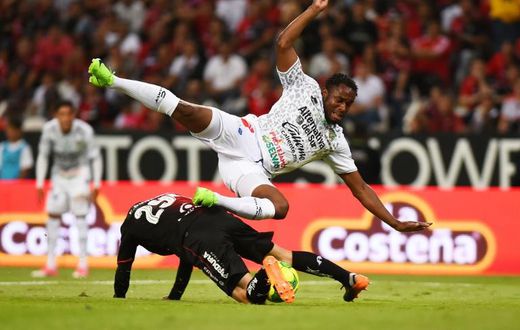 A file photo of Sao Tome e Principe captain Luis Leal (R) playing for Mexican club Chiapas