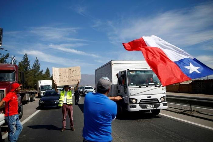 Drivers angry over toll charges demonstrate as part of protests over socio-economic woes