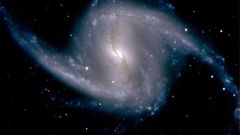 Spiral galaxy NGC 1365 observed from Chile in 2012 -- a new method gauges how to measure the universe's accelerating growth