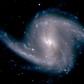 Spiral galaxy NGC 1365 observed from Chile in 2012 -- a new method gauges how to measure the universe's accelerating growth