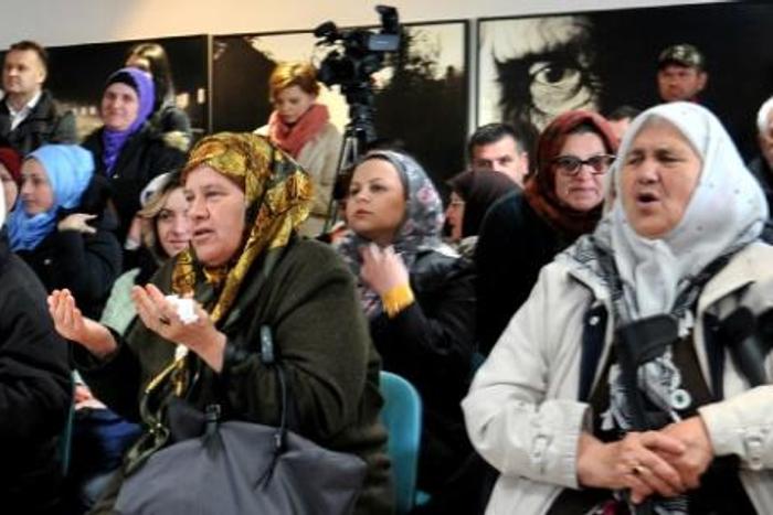 Bosnian Muslim women, who survived the 1995 Srebrenica massacre, watched the end of the trial together at the Srebrenica memorial in Potocari