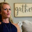 Kacey Ruegsegger Johnson, a survivor of the Columbine High school shooting in 1999, speaks with reporters from AFP in her house in Raleigh, North Carolina