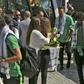 Palestinian women welcome Saudi Arabia's national football team with flowers