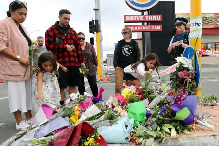 People from all walks of life arrived at the police barriers near the mosques on Saturday to pay their respects and to show support for New Zealand's 50,000 Muslims