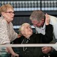 Greek World War II rescuer Melpomeni Dina Gianopoulou is reunited with Holocaust survivors Yossi Mor (R) and his sister Sarah Yanai (L) at the Yad Vashem centre in Jerusalem on November 3, 2019