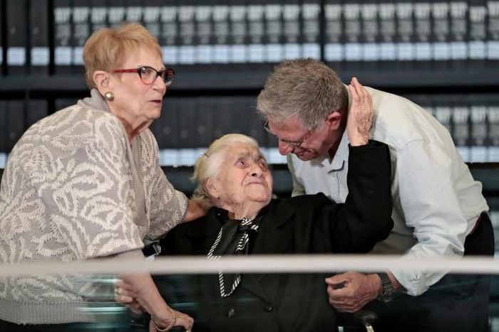Greek World War II rescuer Melpomeni Dina Gianopoulou is reunited with Holocaust survivors Yossi Mor (R) and his sister Sarah Yanai (L) at the Yad Vashem centre in Jerusalem on November 3, 2019