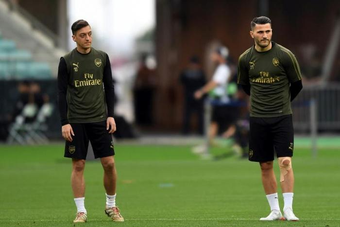 English football need to wake up to the threat to footballers and their families security in the wake of the attack on Arsenal stars Mesut Ozil and Sead Kolasinac security expert Alex Bomberg told AFP