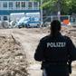 A police officer secures access to the site in Hanover's Zoo district after the bomb's discovery which forced thousands of residents to leave their homes while it was defused