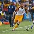 Kaizer Chiefs two-goal star Samir Nurkovic (L) is pursued by Tebogo Langerman of Mamelodi Sundowns during a South African Premiership match in Pretoria Sunday