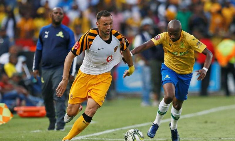 Kaizer Chiefs two-goal star Samir Nurkovic (L) is pursued by Tebogo Langerman of Mamelodi Sundowns during a South African Premiership match in Pretoria Sunday