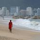 A lifeguard walks along the beach in Acapulco, Mexico on September 18, ahead of Lorena's expected arrival