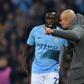 Manchester City manager Pep Guardiola gestures to Benjamin Mendy