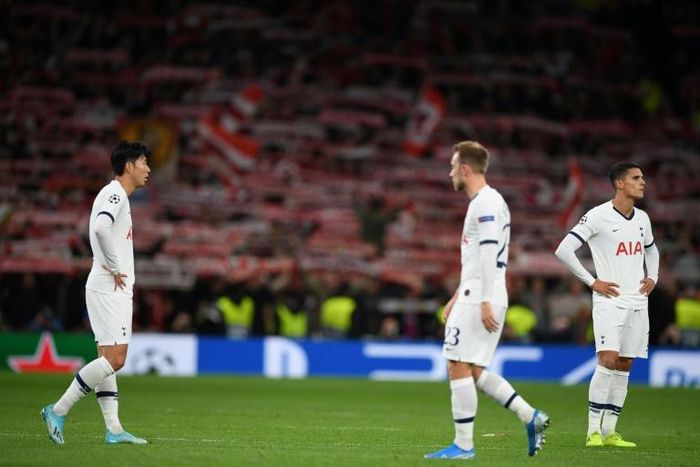 Tottenham players react after their 7-2 Champions League defeat against Bayern Munich