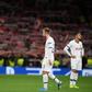Tottenham players react after their 7-2 Champions League defeat against Bayern Munich