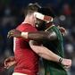 Captain Siya Kolisi (R) hugs teammate Duane Vermeulen, wearing a Wales shirt, after a 19-16 World Cup semi-final victory last Sunday