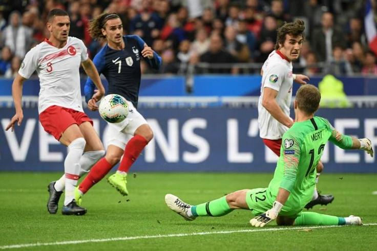 Turkey goalkeeper Mert Gunok (R) was excellent as France could only manage a 1-1 draw at home in Euro 2020 qualifying