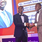 Dr. Agyapong Siaw receiving his award