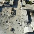 Destruction and damaged buildings from Syrian government forces' bombardment on the village of Al-Tahh in the northwestern Idlib province