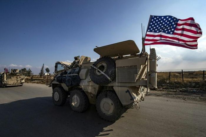 A convoy of US troops is pictured outside the Kurdish-majority city of Qamishli, in Syria's northeastern Hasakeh province on November 2, 2019