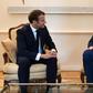 French President Emmanuel Macron (left) meets Ukrainian film director Oleg Sentsov, released last month by Russia in a prisoner swap with Kiev