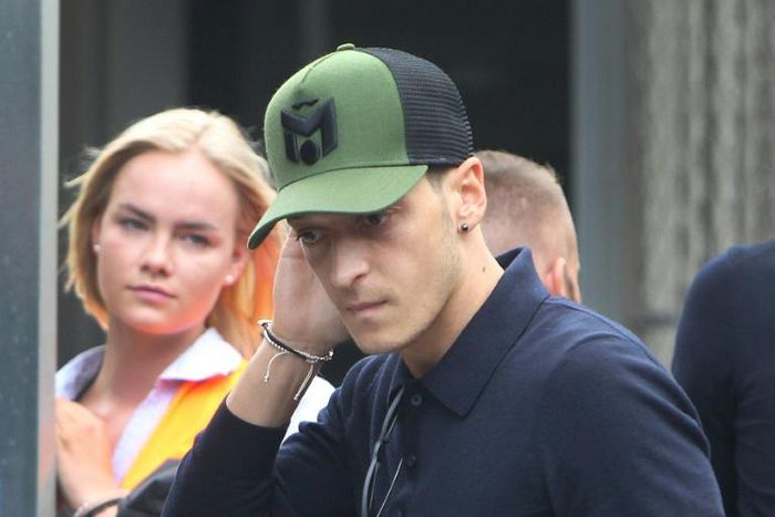 Arsenal midfielder Mesut Ozil has been criticised in Germany for reportedly inviting Turkey President Recep Tayyip Erdogan to his wedding this summer