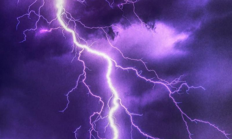 Lightning strike kills two, injures one