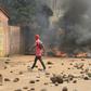 Pockets of violence have erupted around the outer districts of Conakry, with hundreds of police clashing with demonstrators
