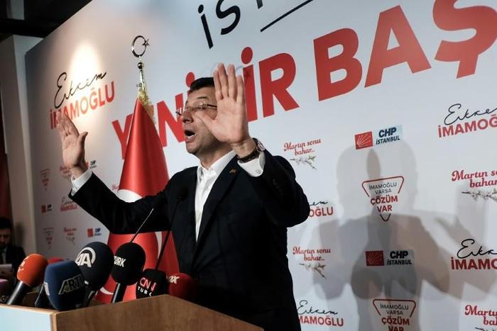 Turkey's ruling AKP appealed against the result showing Istanbul opposition candidate Ekrem Imamoglu (C) was ahead