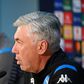 Napoli coach Carlo Ancelotti (R) and Spanish forward Fernando Llorente (L) attend a press conference before their Champions League opener against Liverpool.