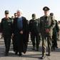 A handout picture provided by the Iranian presidency on Sunday shows President Hassan Rouhani (C) with top military officials