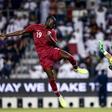 Qatar's forward Almoez Ali (L), the top scorer in the 2019 Asian Cup, struck with a powerful header in the fourth minute and then applied the finishing touch to a fine string of passes in the 11th