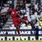 Qatar's forward Almoez Ali (L), the top scorer in the 2019 Asian Cup, struck with a powerful header in the fourth minute and then applied the finishing touch to a fine string of passes in the 11th