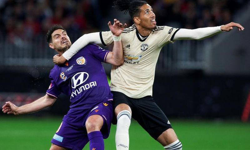 Smalling (R) has joined Roma on loan