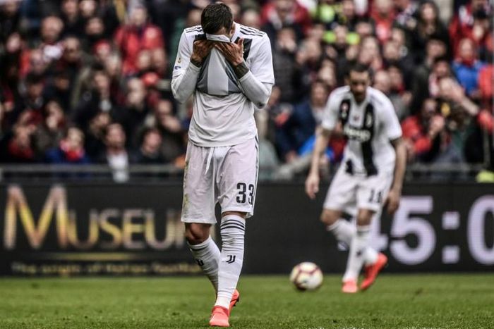 Juventus forward Federico Bernardeschi reacts after his side's first Serie A defeat of the season to Genoa