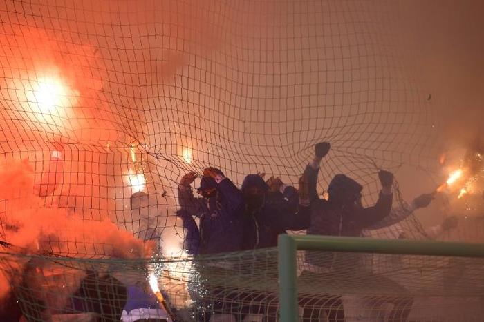 Hertha Berlin's fans light flares during their team's 1-0 defeat at FC Union
