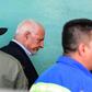 Panama's former president (2009-2014) Ricardo Martinelli (C), is escorted by police officers as he leaves the court where he was attending a hearing over wiretapping allegations