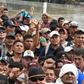 Honduran migrants in a caravan heading to the US arrive at the border crossing point with Mexico, in Ciudad Tecun Uman, Guatemala, on October 19, 2018