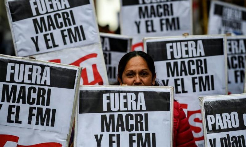 People protest in Buenos Aires in August 2019 against President Mauricio Macri's economic policies