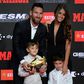 Barcelona's Argentinian forward Lionel Messi (L) poses with his wife Antonella Roccuzzo and his sons Thiago and Mateo after receiving his sixth Golden Shoe award after receiving the 2019 European Golden Shoe honoring the year's leading goalscorer durin...