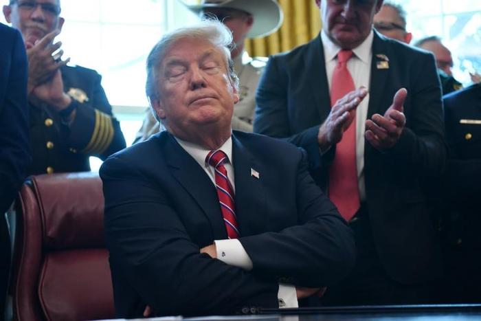 US President Donald Trump, seen here in the Oval Office March 15, 2019, complains he is being blamed for the massacre of Muslims in New Zealand