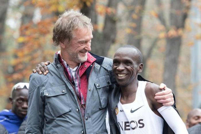 Eliud Kipchoge celebrates with Ineos owner Jim Ratcliffe after the Kenyan broke the two-hour marathon barrier in an event heavily sponsored by the petrochemicals company