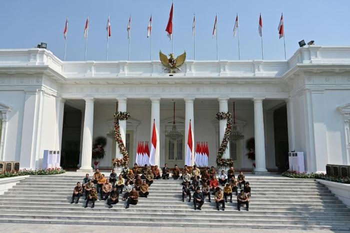 Indonesian President Joko Widodo introduced his new cabinet on the palace steps