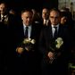 Accompanied by Germany's Foreign Minister Heiko Maas (C), Pompeo left flowers to mark last month's fatal shooting by a far-right gunman