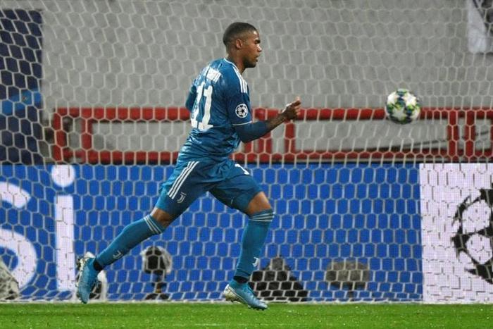 Juventus forward Douglas Costa celebrates after scoring his first goal this season in the Champions League in Moscow.