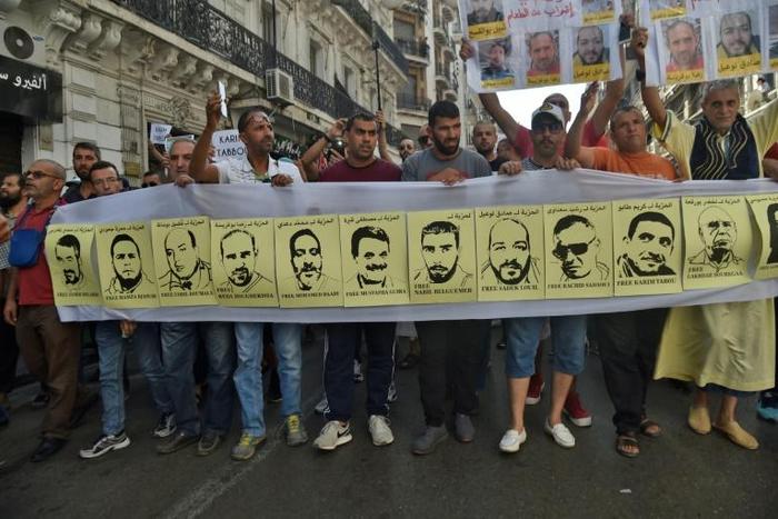 Algerians stage protest to denounce the arrest of dozens of people by the authorities during protests against the political establishment