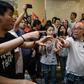 A group of men, many waving Chinese flags, attacked people perceived to be pro-democracy protesters