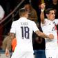 Angel Di Maria celebrates with Mauro Icardi after scoring one of his two goals as Paris Saint-Germain beat Real Madrid 3-0 in their Champions League opener