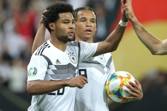 Germany winger Serge Gnabry (L) scored twice in June's 8-0 win over Estonia, but expects a tough away game in Tallinn in Sunday's Euro 2020 qualifier.