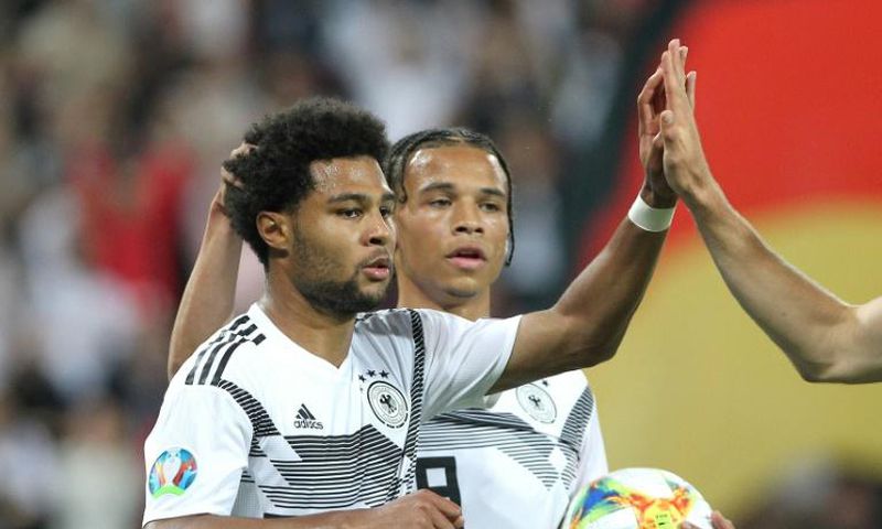 Germany winger Serge Gnabry (L) scored twice in June's 8-0 win over Estonia, but expects a tough away game in Tallinn in Sunday's Euro 2020 qualifier.