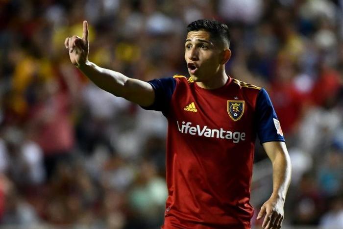 Argentine striker Jefferson Savarino scored the winning goal for Real Salt Lake in a 2-1 Major League Soccer victory Sunday over Houston that clinched a playoff berth for the Utah club